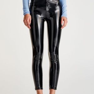 Black vinyl skinny pants